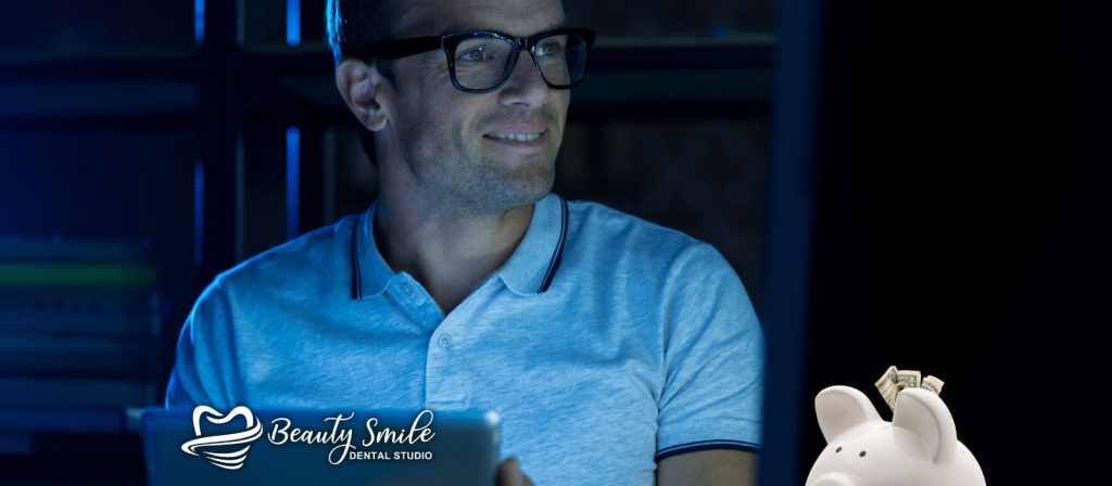 A smart, confident man smiling after saving on dental care at Beauty Smile Dental Studio in Tijuana.